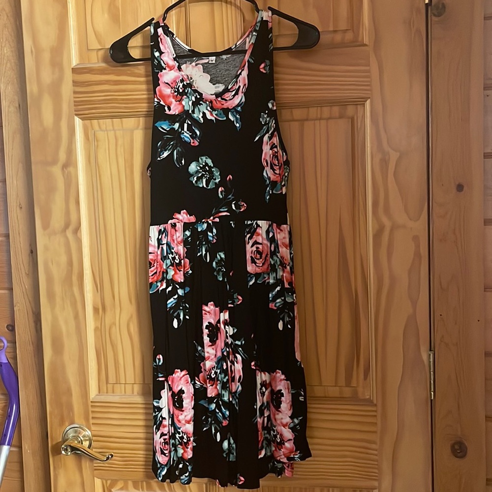 Cute sundress with side pockets and elastic waist very soft and stretchy